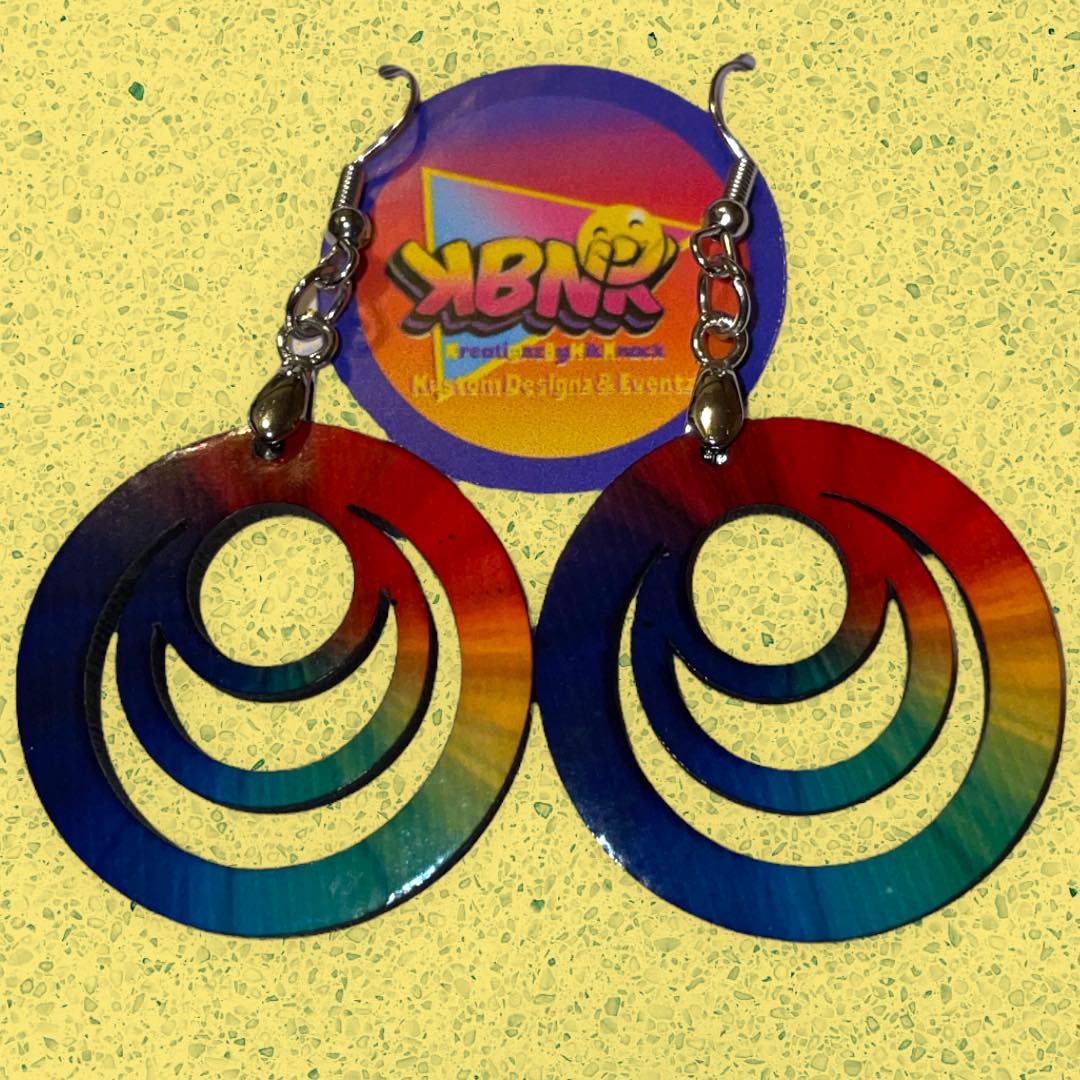 A pair of colorful Multi color circle earrings by K B N K.