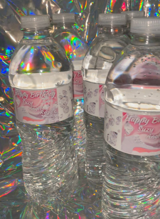 A group of One Dozen Kustom Wrap water bottles from K B N K with labels.